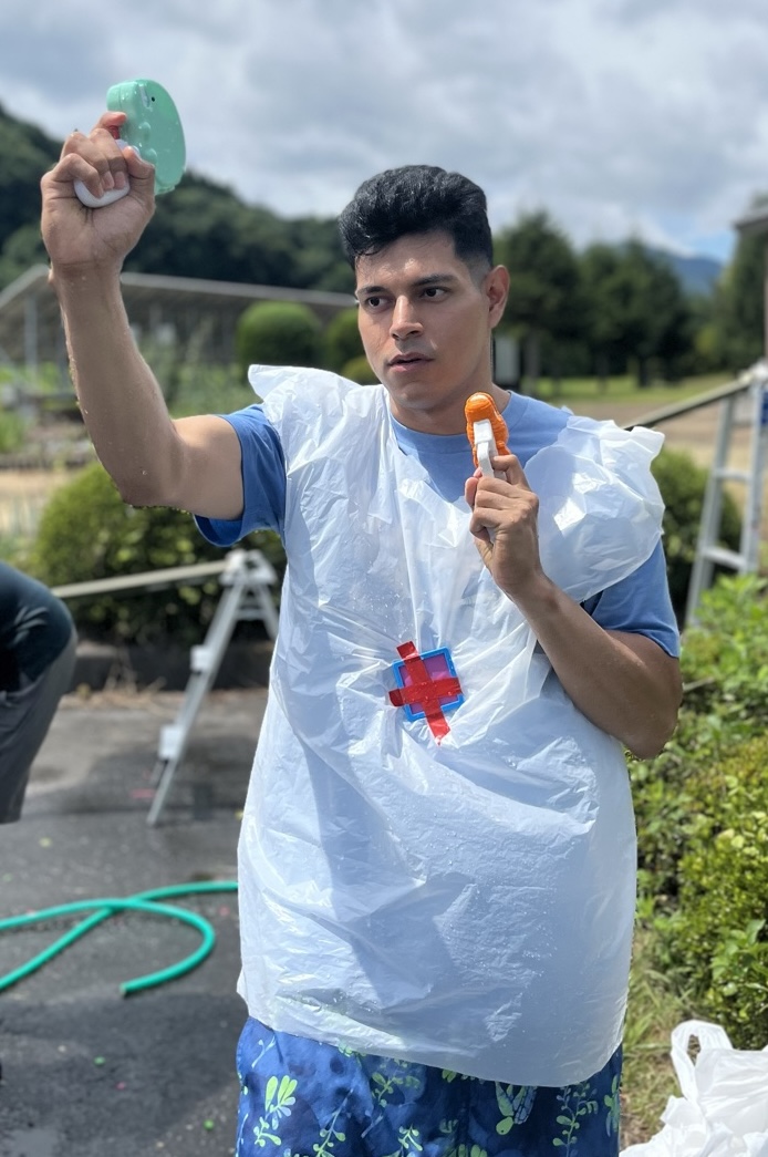 Cristian, the maker of TakkoTaco, at a water gun event in Takko